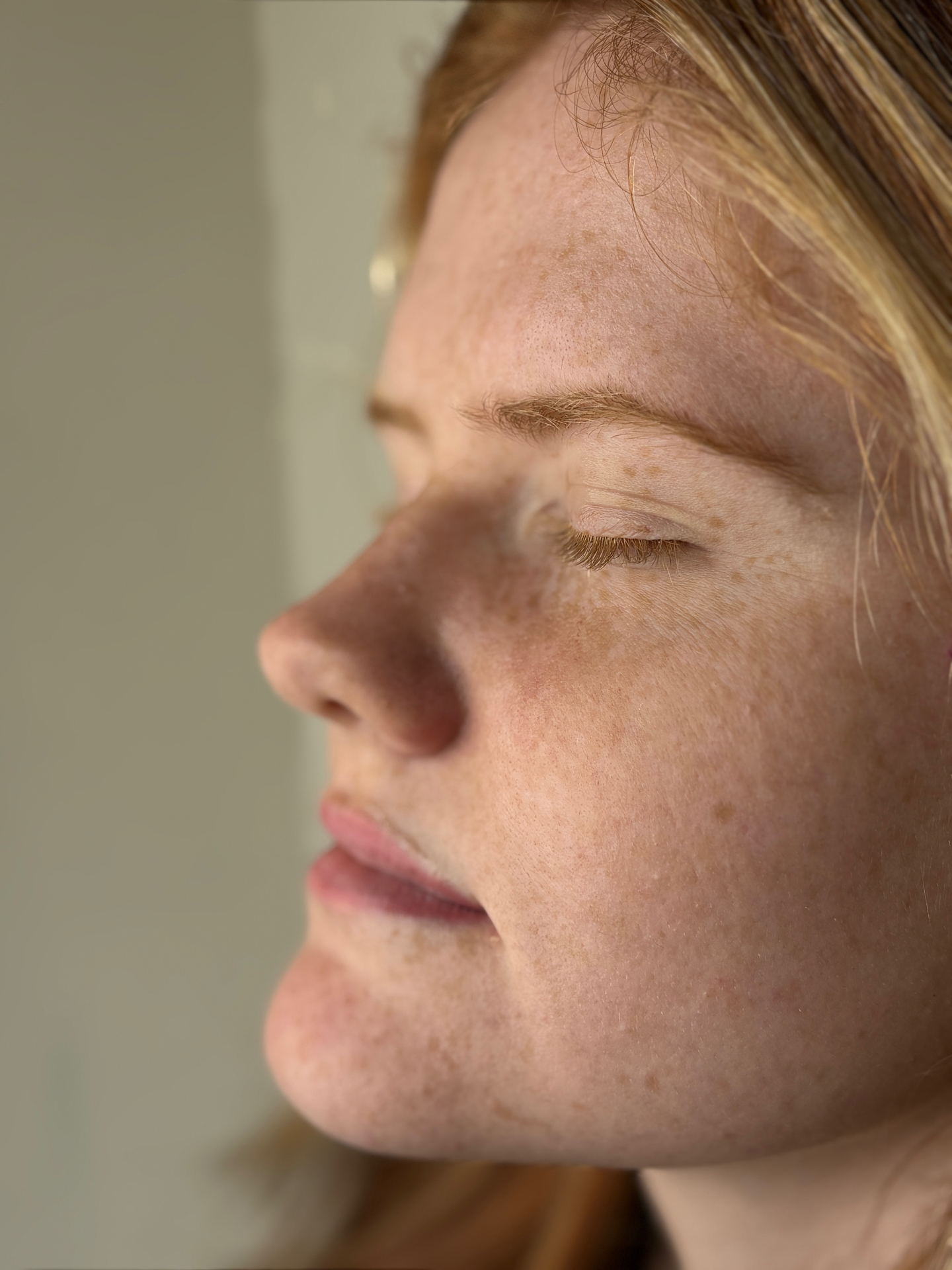 Client lip blush result — left profile